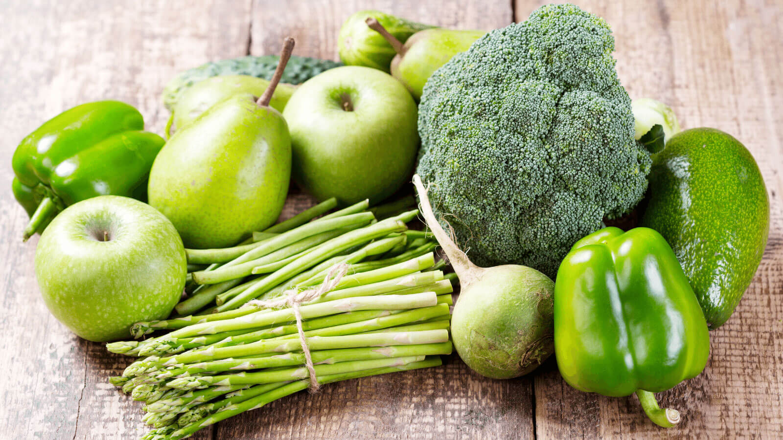 variety of green fruit and veggies