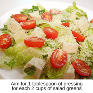 2 cups of salad with 1 tablespoon of dressing
