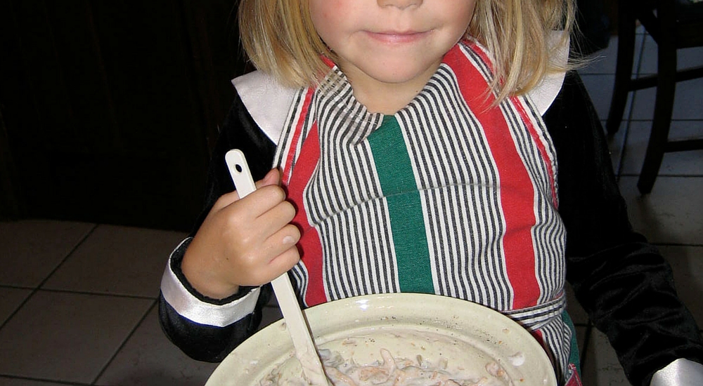 young girl cooking