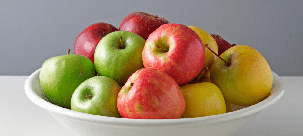 variety of apples in a bowl