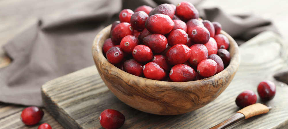 cranberries in wooden bowl