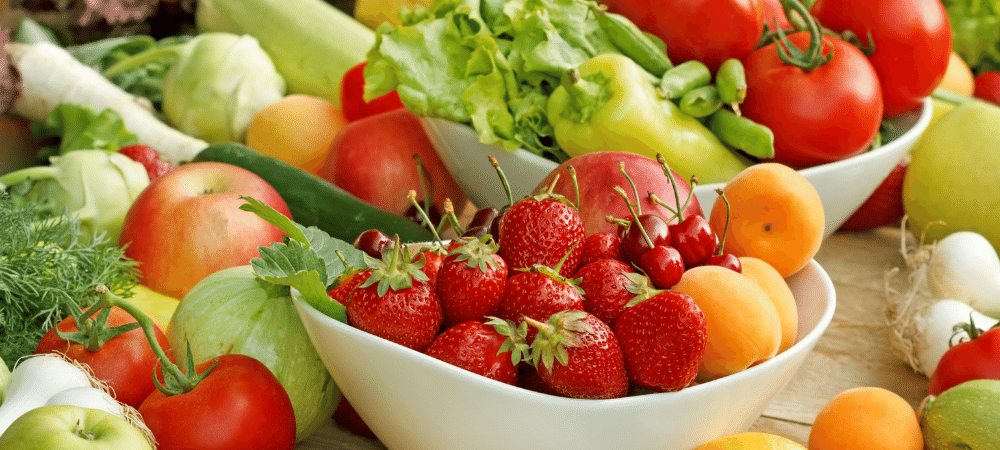 variety of fresh fruits and vegetables on a table