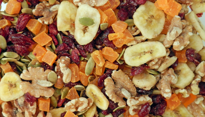 How to make your own trail mix using whole grains, nuts, seeds and dried fruit.