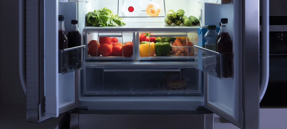 kitchen refrigerator open with produce