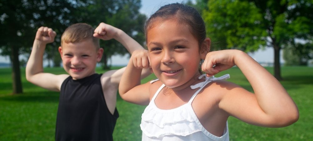 kids showing their muscles