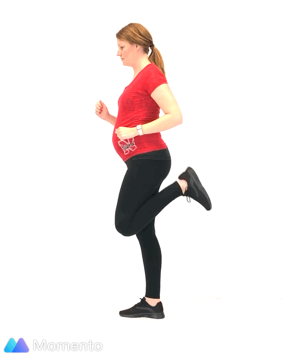 An individual modeling how to do the heel kicks low impact exercise.