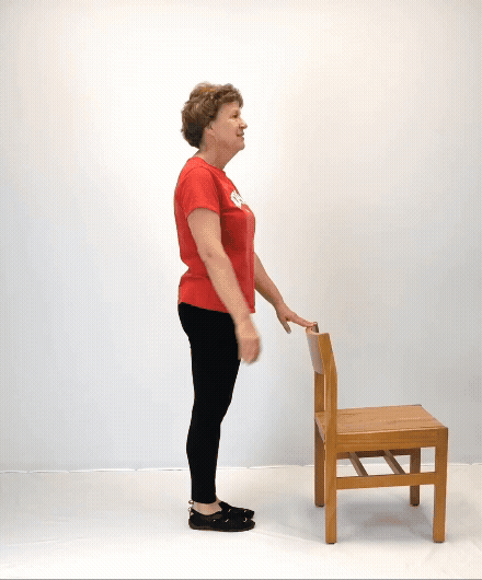 An individual modeling how to do a clock reach exercise.