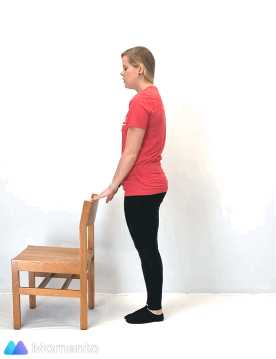 An individual modeling how to do a modified pyramid yoga pose.
