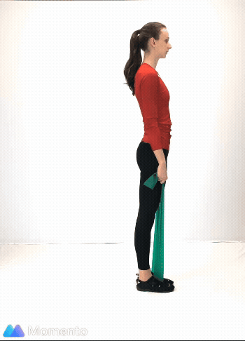 An individual modeling how to do a stationary lunge workout using a resistance band.