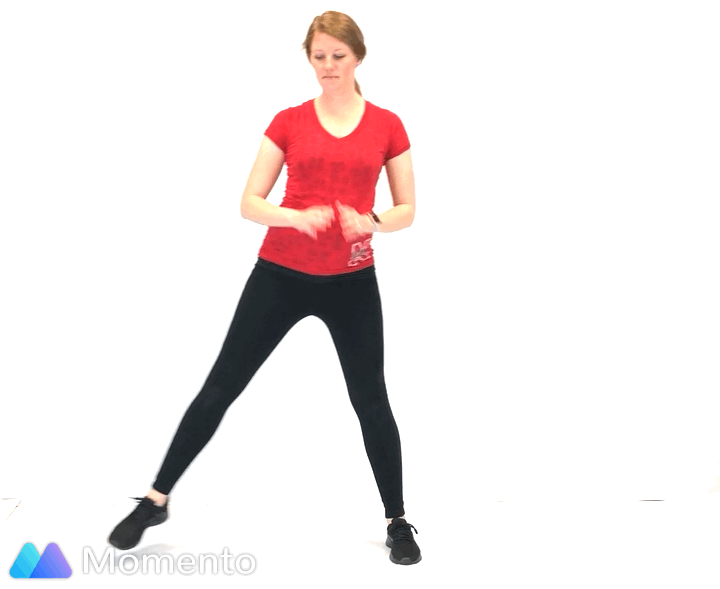 A pregnant women modeling how to do a side lunge exercise.