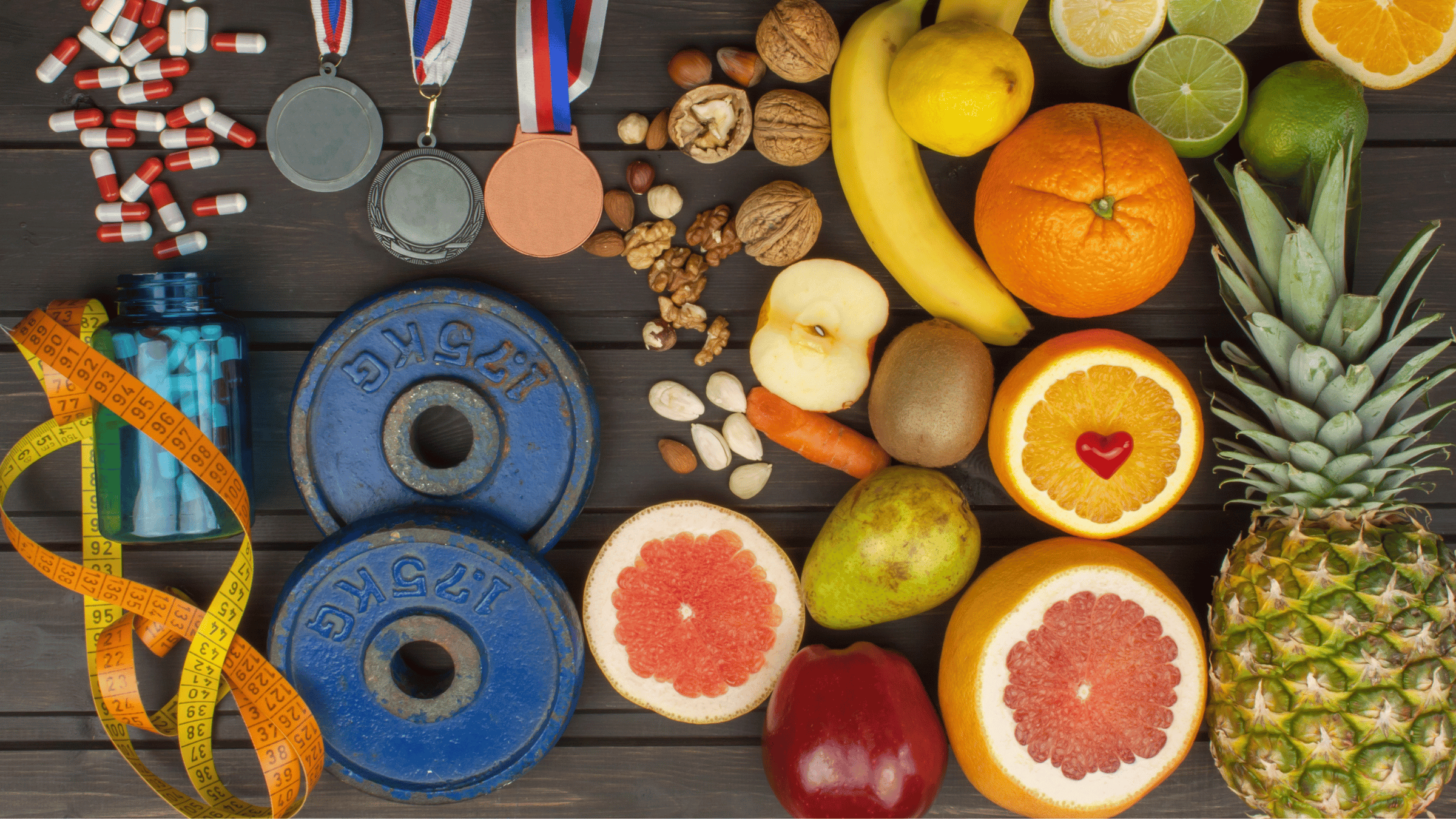 sports nutrition background with weights, supplements, and fruit