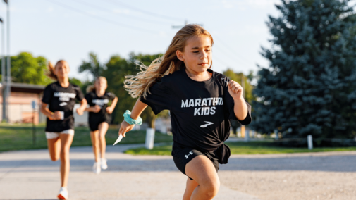 girl running in a Marathon Kids run