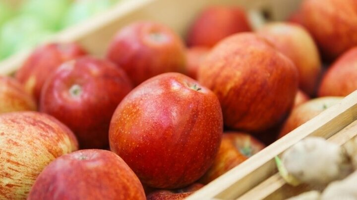 red apples in a crate