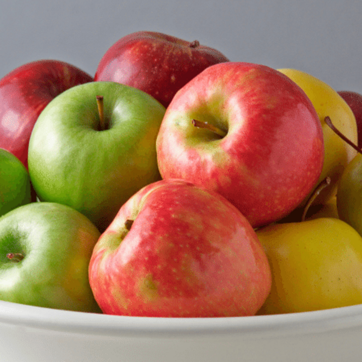 variety of apples in a bowl