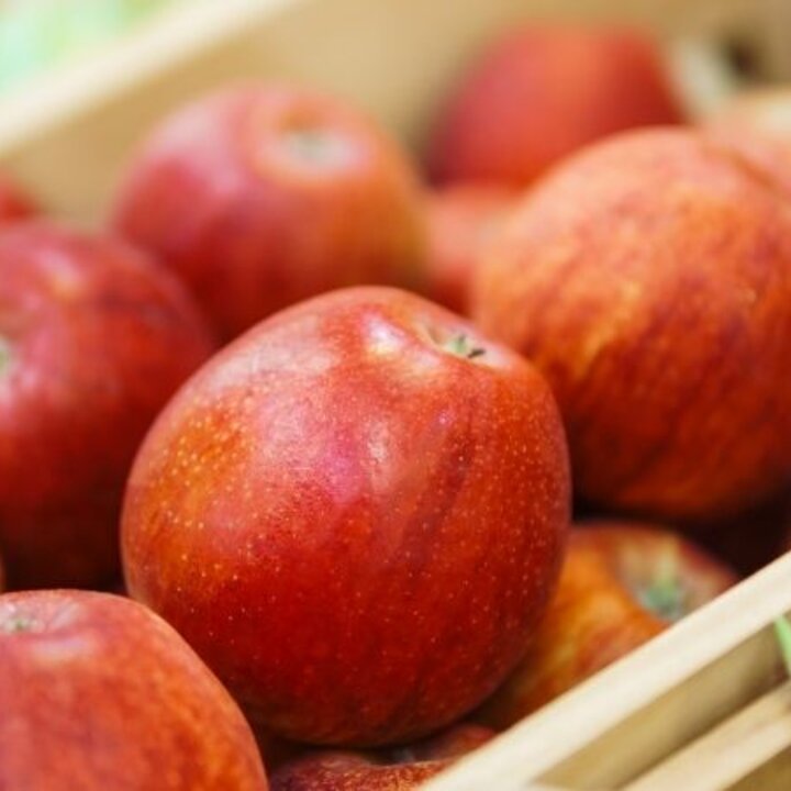 red apples in a crate