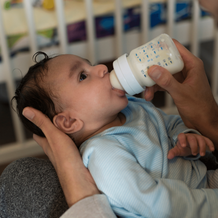 baby drinking a bottle