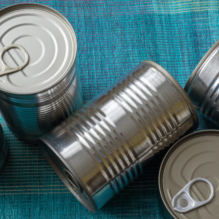 group of canned food on a table