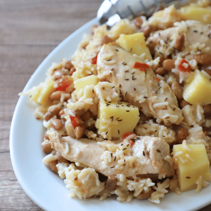 Chicken with rice, potatoes and beans. 