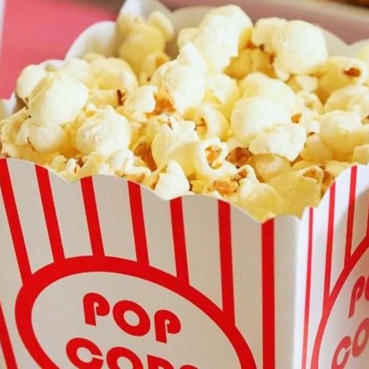 popcorn in red and white tub