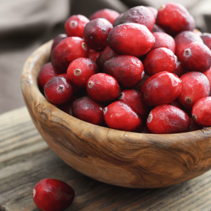 cranberries in wooden bowl