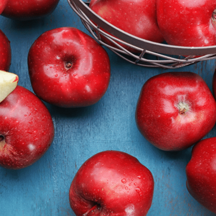 red delicious apples on table