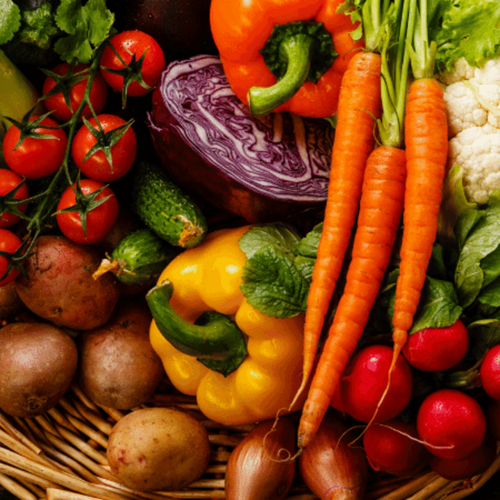variety of fresh vegetables in a basket