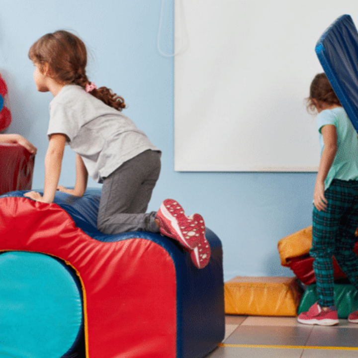 preschoolers playing in the gym