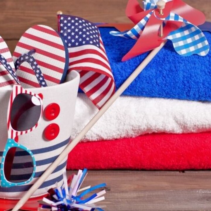 red, white and blue towels, bucket, flip flops