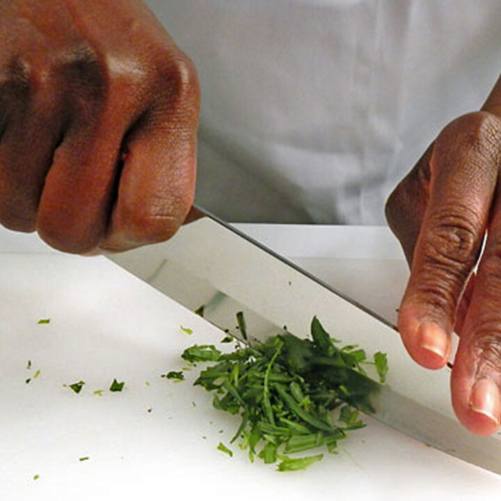 chopping herbs with a knife