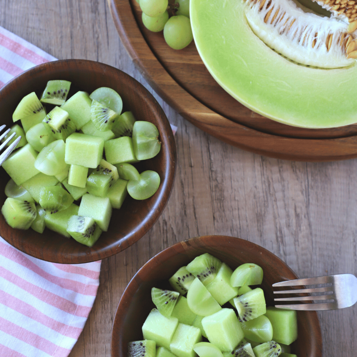 Bowl of kiwi, green grapes, and honeydew melon