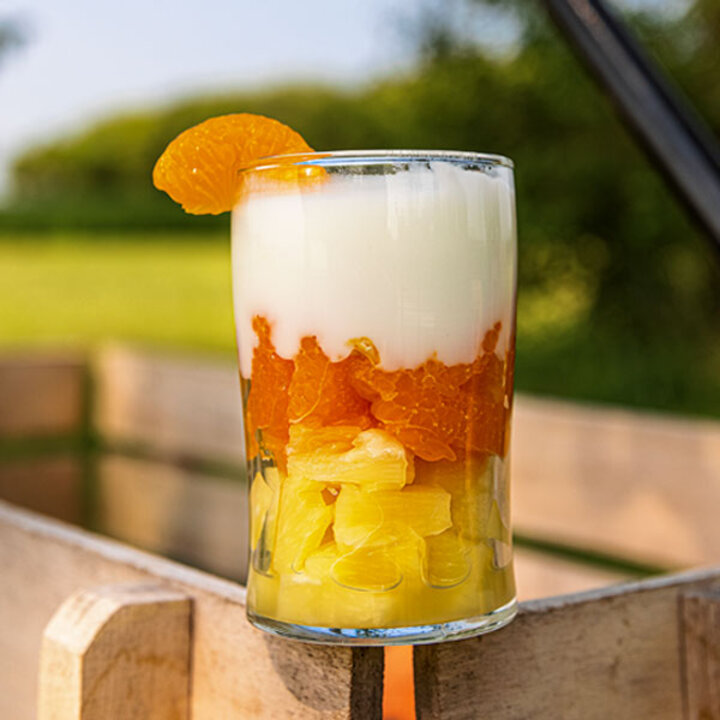 fruit parfait with pineapple, oranges and yogurt