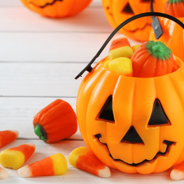 Halloween candy in jack o' lantern buckets