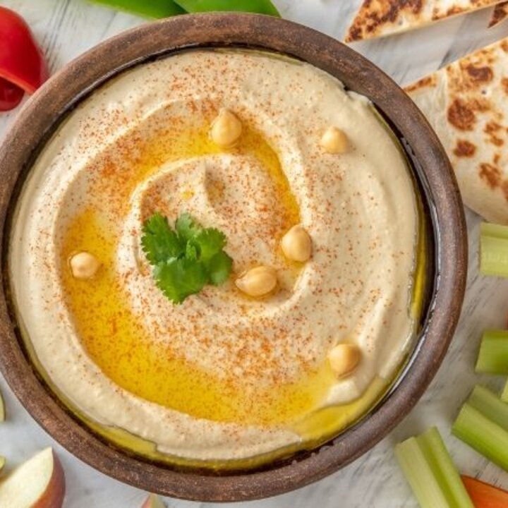 hummus with vegetables, fruit and bread