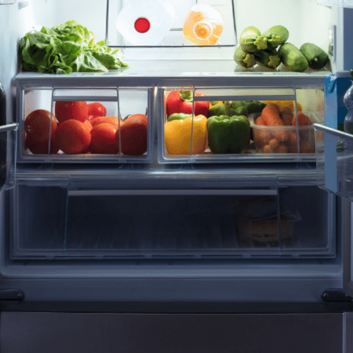 kitchen refrigerator open with produce