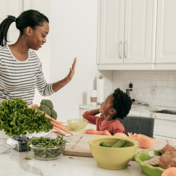 mom and child cooking in the kitchen