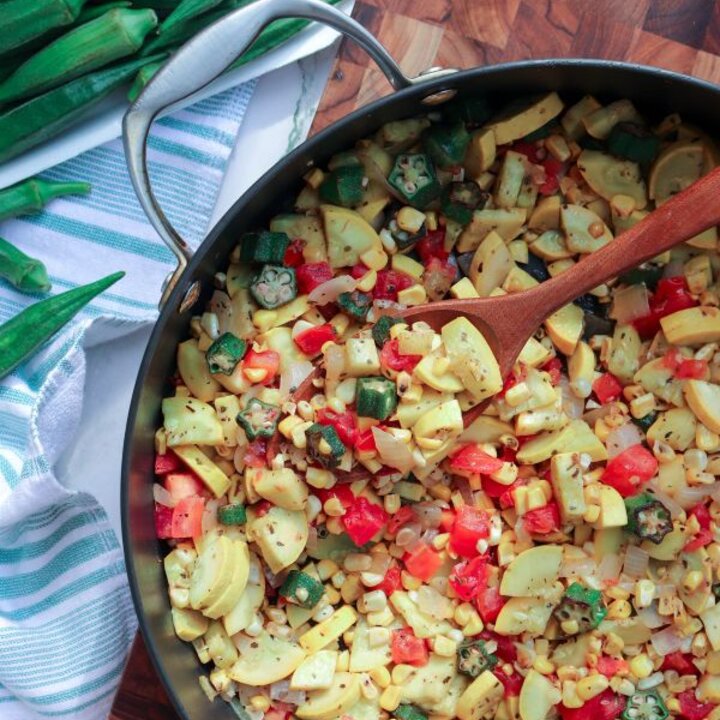 Skillet with okra succotash and fresh okra