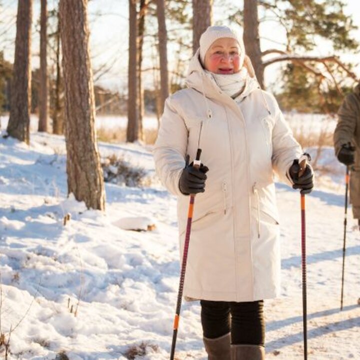 older adults walking snow