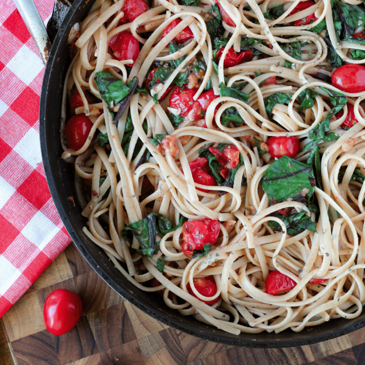 Noodles with tomatoes and Swiss chard