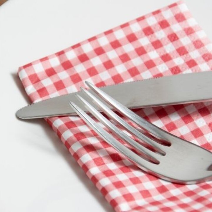 plate with napkin, fork, knife