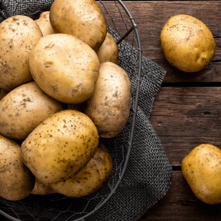 potatoes in a basket on a table