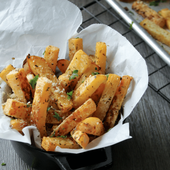 Rutabaga fries in parchment paper cup