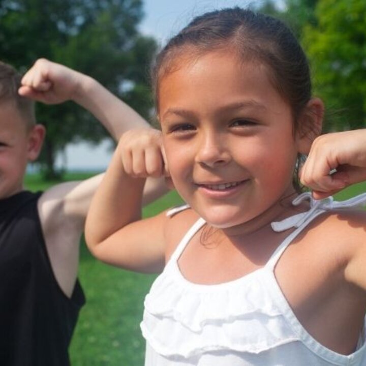 kids showing their muscles