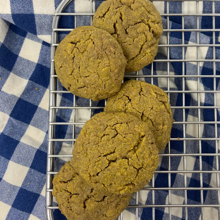 Sunflower cookies on a cooling rack