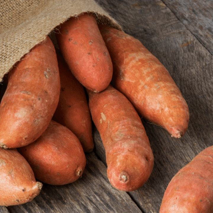 sweet potatoes in a burlap sack