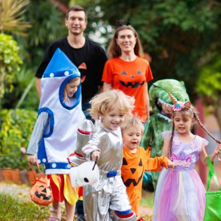 family trick or treating on Halloween