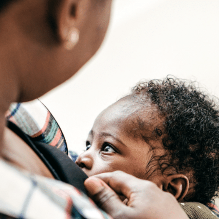 mother breastfeeding baby