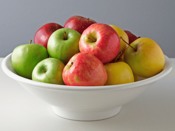 variety of apples in a bowl