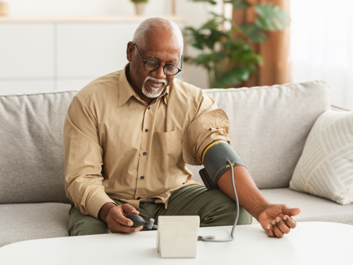 a man measuring his blood pressure