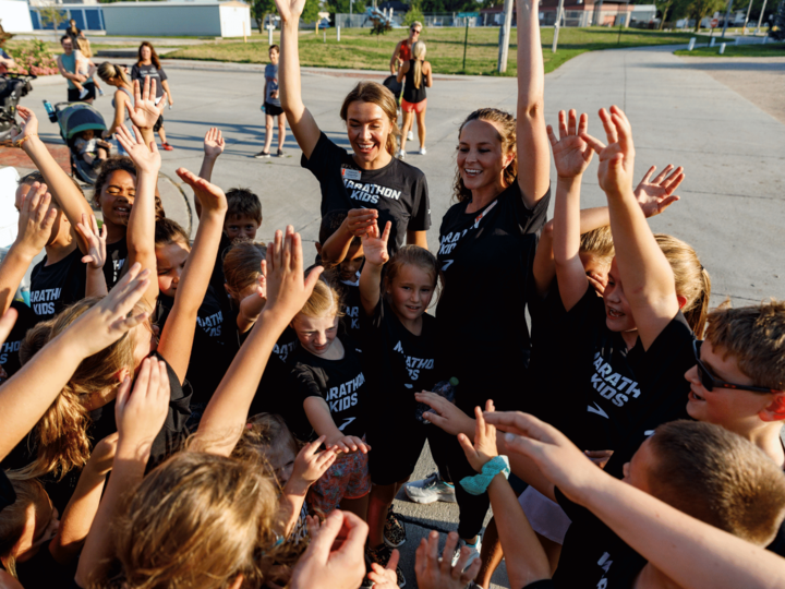 Marathon Kids coaches with group of kids