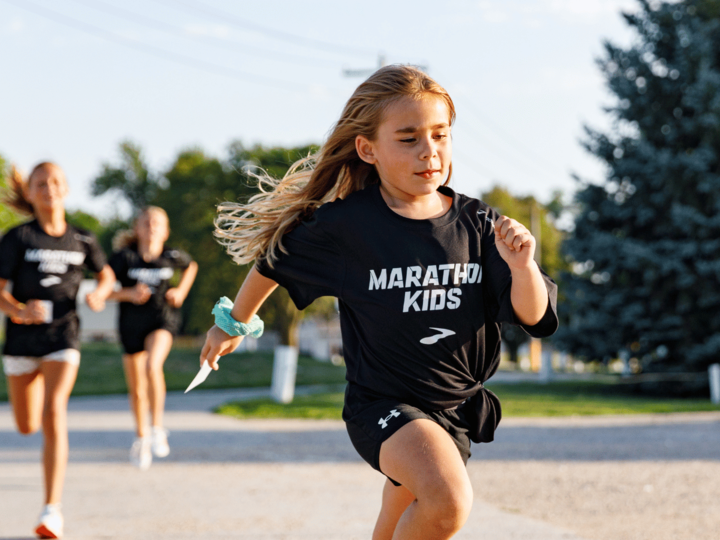 girl running in a Marathon Kids run